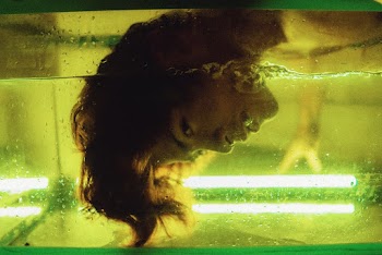 Woman's Head Submerged on Water