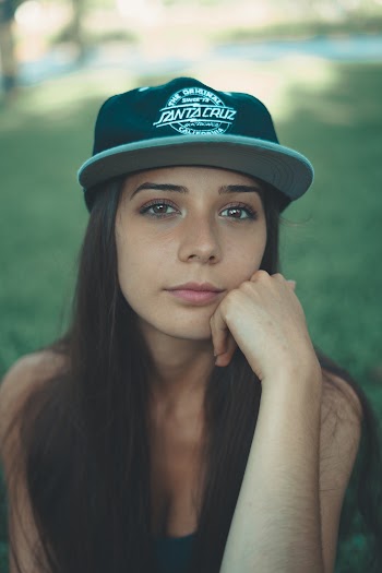 Woman's Left Hand Resting On Cheek