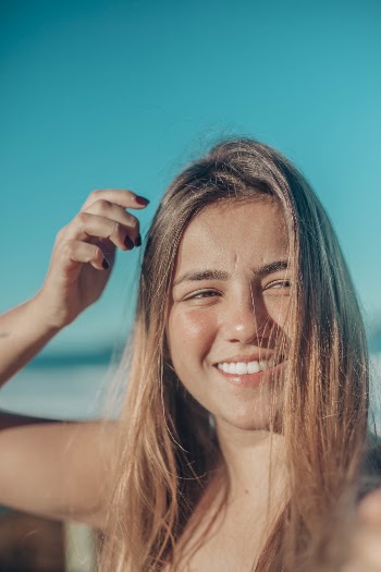 Woman About Holding Her Hair