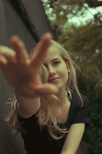 Woman About to Reach Camera