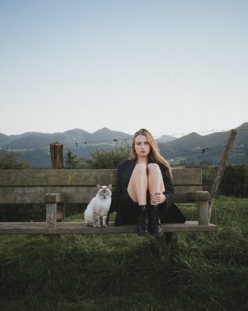 Woman and Cat Sitting on Bench · Free Stock Photo