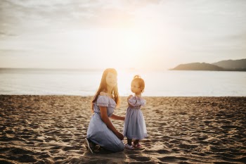 Woman and Girl by the Sea