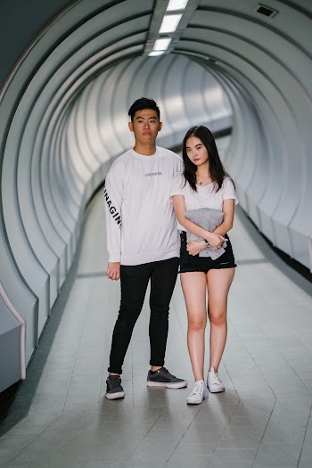 Woman and Man Inside Tunnel