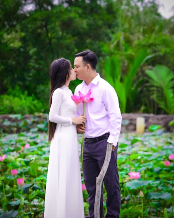 Woman and Man Kissing in Shallow Photo