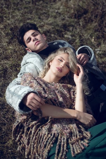 Woman and Man Lying on the Grass