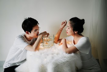 Woman and Man Sitting