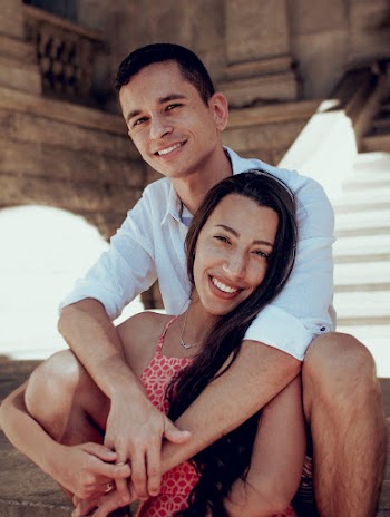 Woman and Man Sitting on Stair