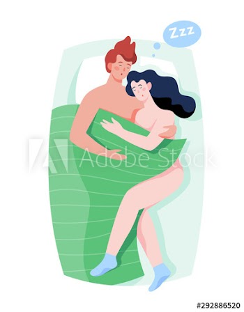 Woman and man sleep together in the bed