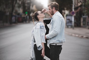 Woman and Man Standing in Front of Each Other