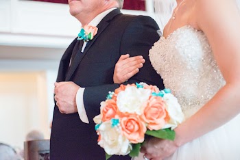 Woman and Man Walking in White Room