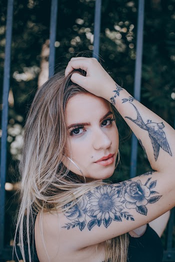 Woman Arm Tattoo