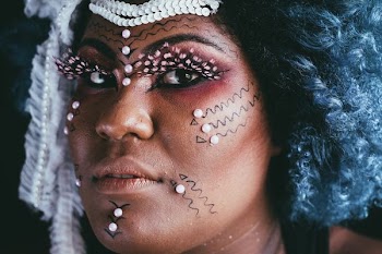 woman beaded face makeup
