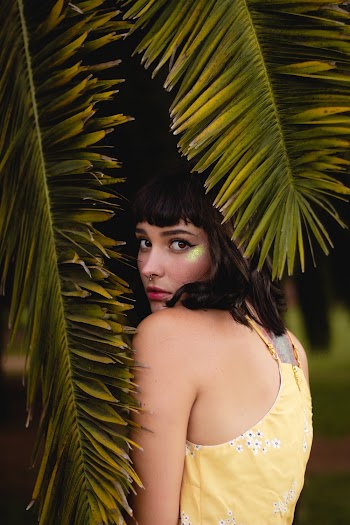 Woman Behind Tree