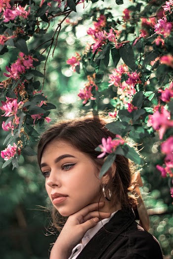 Woman Beside Flowers