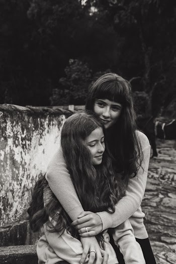 Woman Beside Girl