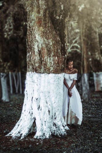 Woman Beside Tree