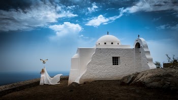 Woman Beside White Concrete Building