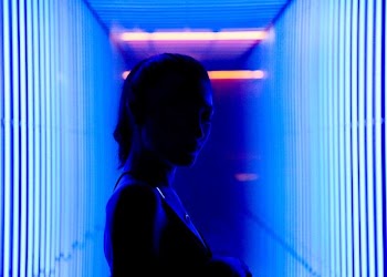 woman between blue lights