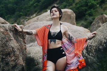 woman between rocks