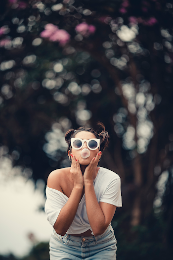 Woman Blowing Bubble Gum