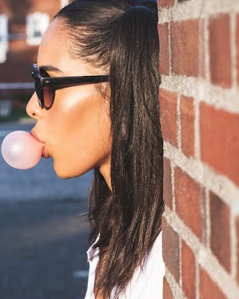 Woman Blowing Bubble Gum