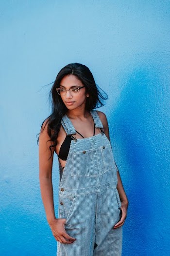 Woman Blue Wall Portrait