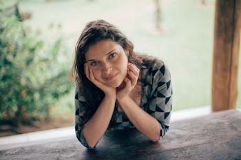 Woman Both Hands on Her Neck