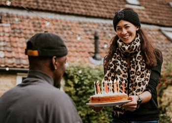 Woman bringing a birthday cake | Free Photo - rawpixel