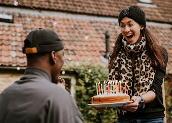 Woman bringing a birthday cake | Free Photo - rawpixel