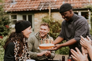 Woman bringing a birthday cake | Free Photo - rawpixel
