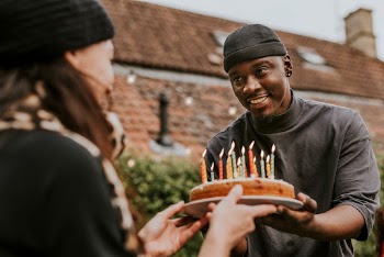 Woman bringing a birthday cake | Free Photo - rawpixel