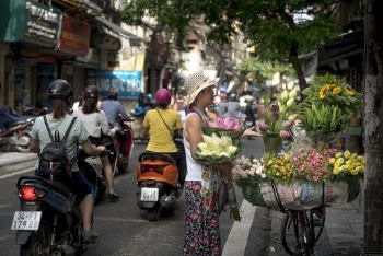 woman buying Holding Flowers Bouquet