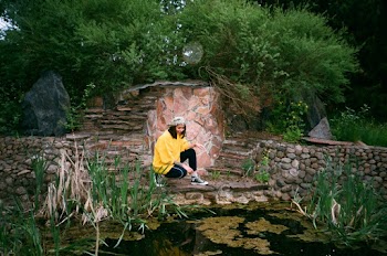 Woman By The Pond