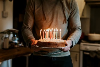 Woman carrying a birthday cake | Free Photo - rawpixel