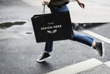 Woman carrying a shopping bag | Free PSD Mockup - rawpixel