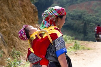 Woman Carrying Baby