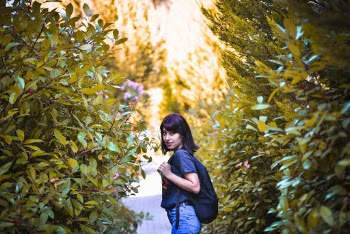 Woman Carrying Black Backpack