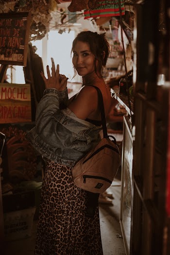 Woman Carrying Brown Backpack