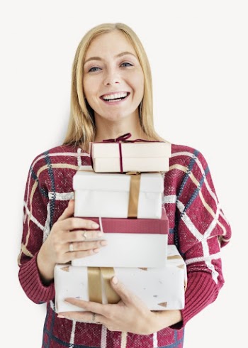 Woman carrying gift boxes isolated | Free PSD - rawpixel