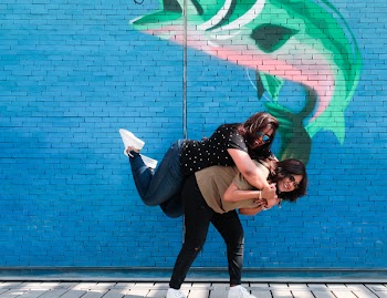 Woman Carrying Her Friend