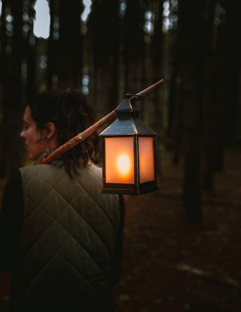 Woman Carrying Lantern