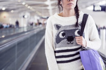 Woman Carrying Purple Shoulder Bag