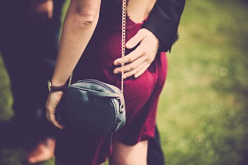 Woman Carrying Sling Bag
