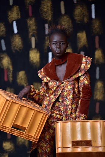 Woman Carrying Two Plastic Crates