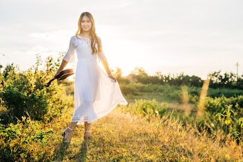 Woman Carrying Ukulele Posing for a Photo