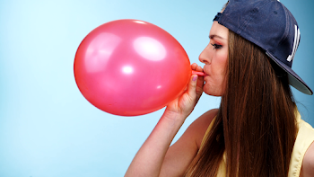 Woman casual style blowing up a red balloon 4K Stock Video Footage ...