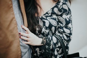 woman clinging to a man