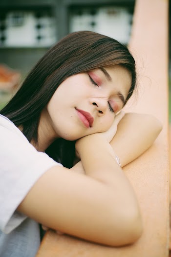 Woman Closing Her Eyes