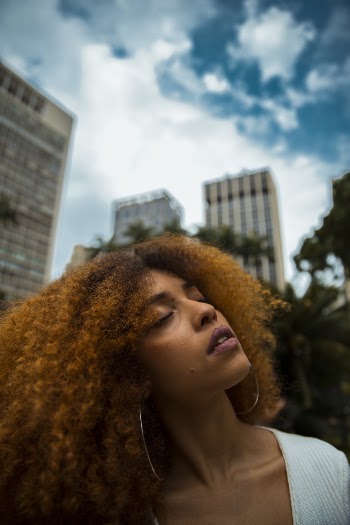 Woman Closing Her Eyes
