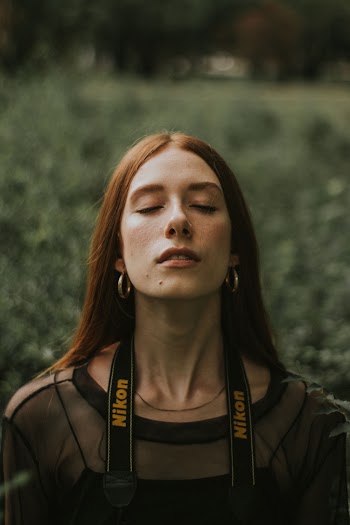 Woman Closing Her Eyes
